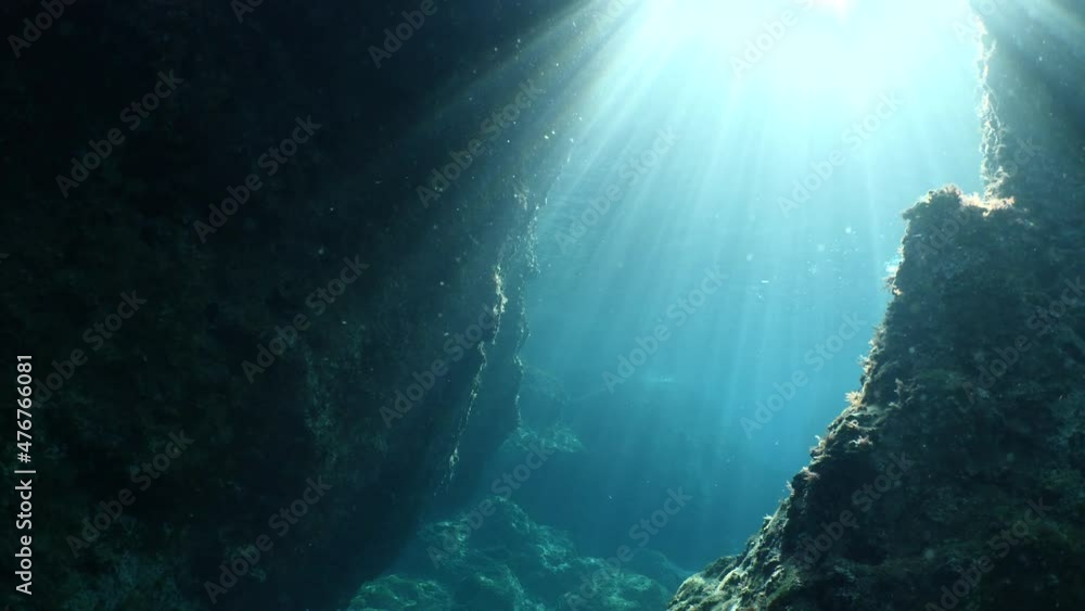 sun ray and sun beam scenery underwater waves on surface of water slow ocean scenery for backgrounds sun ray and sun beam scenery underwater waves on surface of water slow ocean scenery for backgrounds