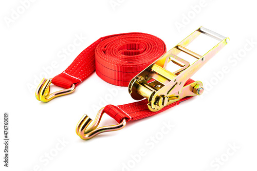 Foto Trailer strop or strap in orange nylon and metal tie isolated over white background