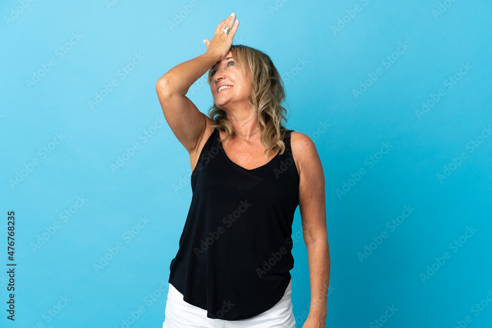 Middle aged blonde woman over isolated background has realized something and intending the solution