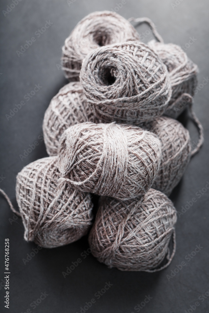 Balls of brown wool yarn made of natural wool. Balls of brown wool yarn made of natural wool.
