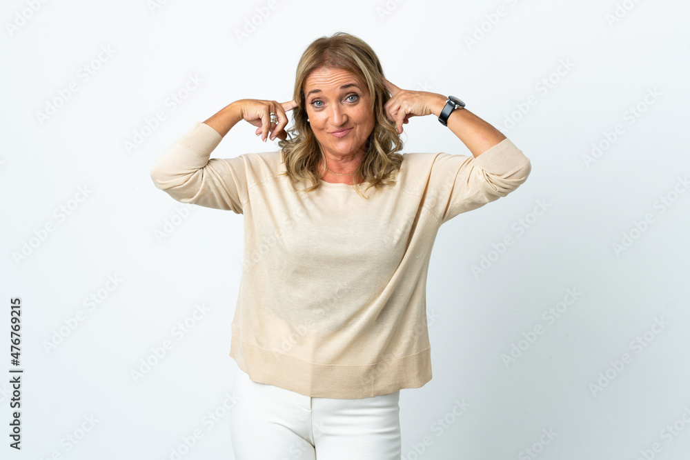 Middle aged blonde woman over isolated white background having doubts and thinking Middle aged blonde woman over isolated white background having doubts and thinking