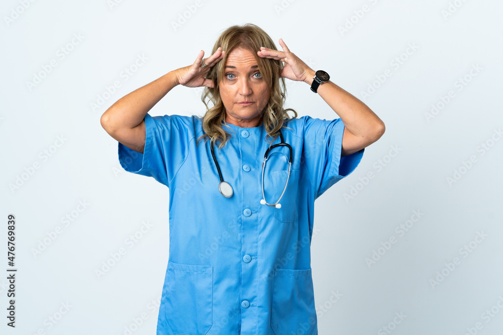 Middle aged surgeon woman over isolated background with surprise expression Middle aged surgeon woman over isolated background with surprise expression