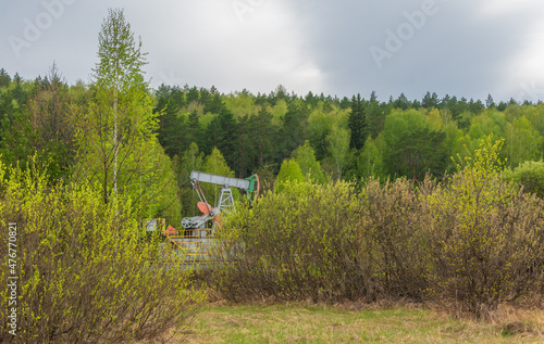 Oil deposit. Pump jacks, which are known as nodding donkeys. Crude oil is found in all reservoirs formed in the earth's crust from the remains of once living creatures