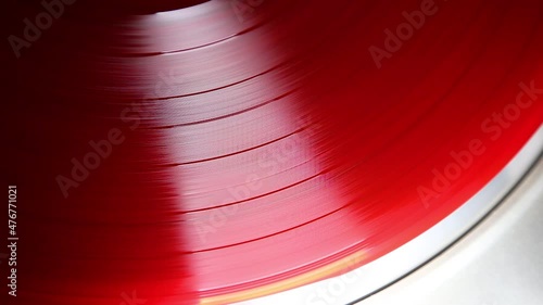red vinyl record spinning 