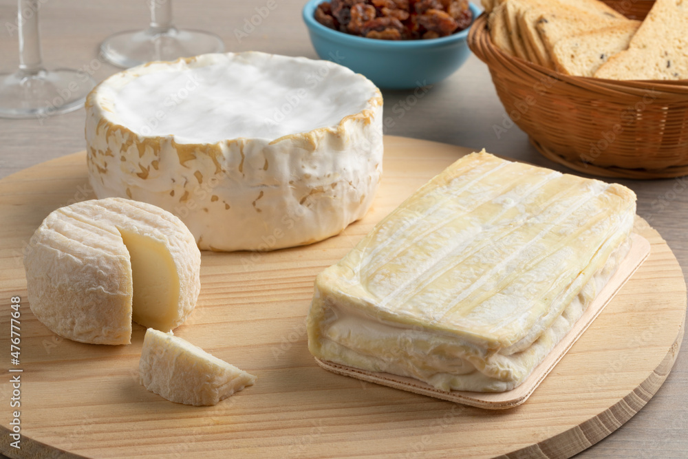 Cheese board with variation of French cheese close up Cheese board with variation of French cheese close up