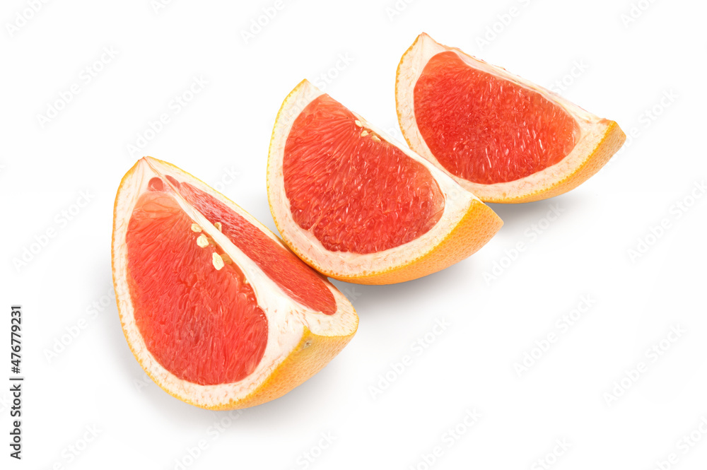 Fresh grapefruit wedge isolated on a white background Fresh grapefruit wedge isolated on a white background