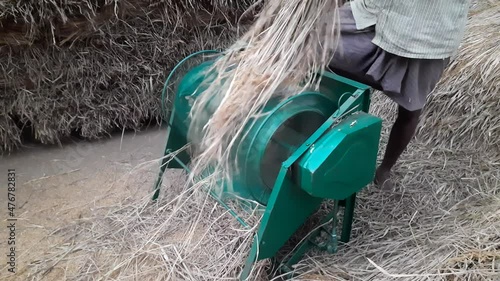 Paddy threshing machine.It is a foot-operated machine.This machine does a lot more work than hands.  The farmers have got a lot of relief from the introduction of machines in the agricultural sector.  photo