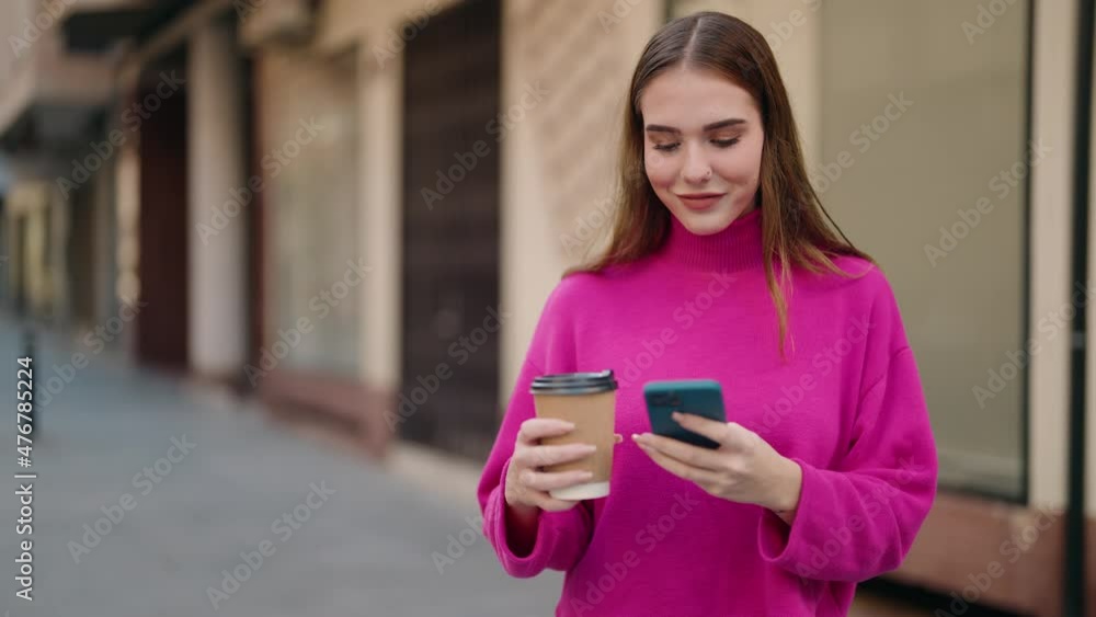 Young blonde woman using smartphone drinking coffee at street Young blonde woman using smartphone drinking coffee at street