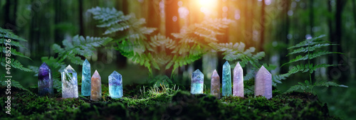 Fényképezés quartz Gemstones on mysterious forest natural background