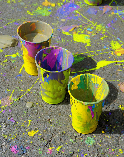 Plastic cups with multi-colored acrylic paint