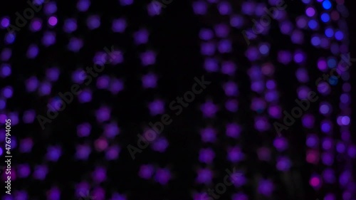 Wallpaper Mural Blurred background of blue-purple flickering lights in the round pattern used to decorate Christmas and New Year festivals Torontodigital.ca