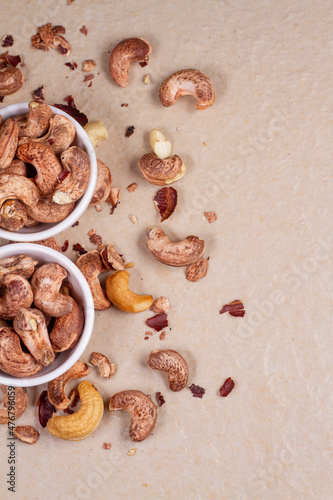 cashews isolated on light background. Top view. Flat lay