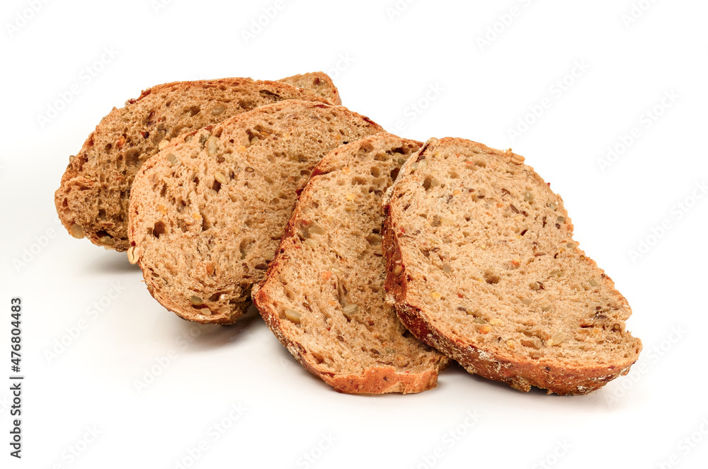 The pieces of cut brown bread close on a white background The pieces of cut brown bread close on a white background
