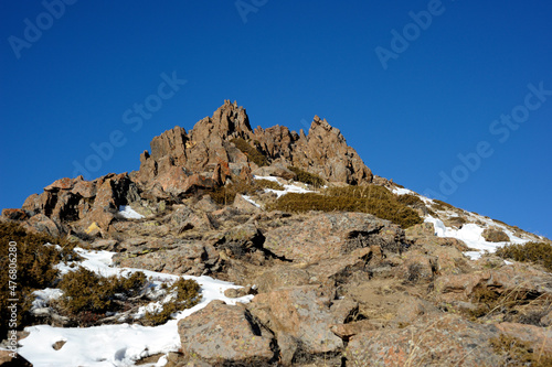 Majestic mountain peaks covered with snow (altitude: over 3200 meters). Ile Alatau, also spelt as Trans-Ili Alatau, etc., is a part of the Northern Tian Shan mountain system in Kazakhstan