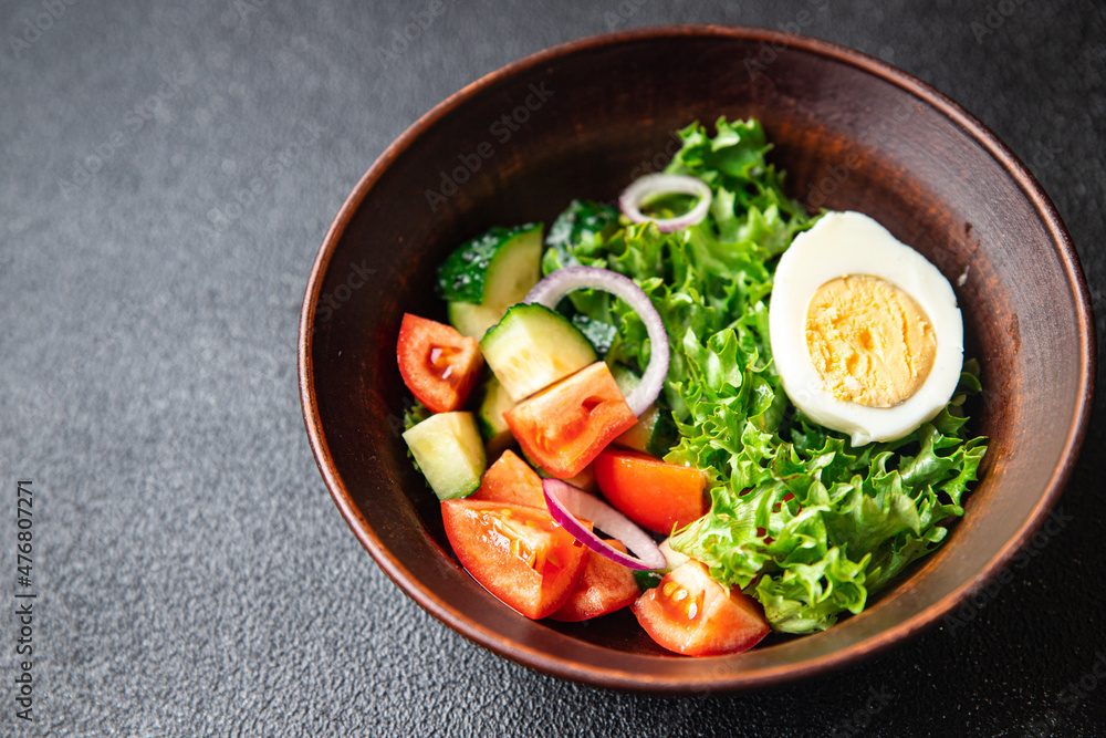 spring egg salad fresh vegetables, cucumber, tomato, lettuce healthy meal food snack on the table copy space food background rustic top view keto or paleo diet veggie vegan or vegetarian food spring egg salad fresh vegetables, cucumber, tomato, lettuce healthy meal food snack on the table copy space food background rustic top view keto or paleo diet veggie vegan or vegetarian food