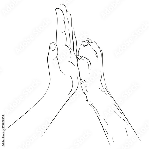 A man's hand and a dog's paw. Friendship and trust