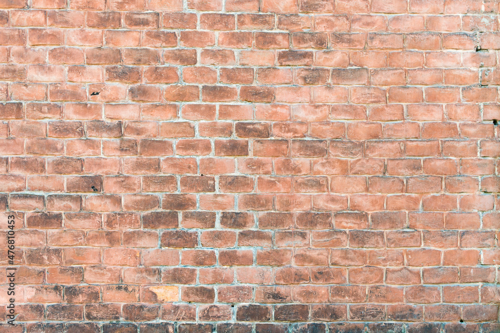 Obraz premium Panoramic background of wide old red brick wall texture. Home or office design backdrop. Stock photo