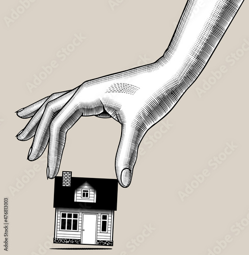 Engraved vintage drawing of Female hand holds in fingers a small model of a residential building