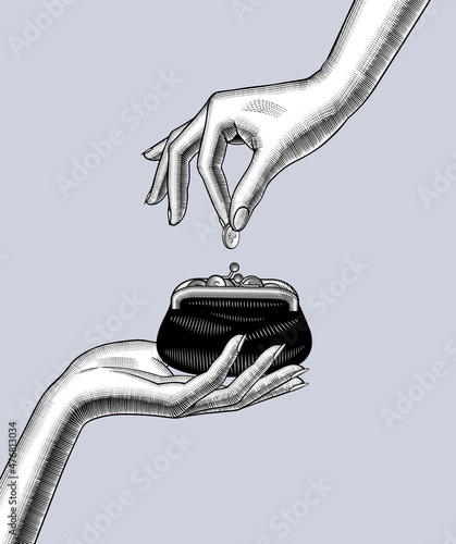 Female hand puts a coin in a retro purse in another woman's hand