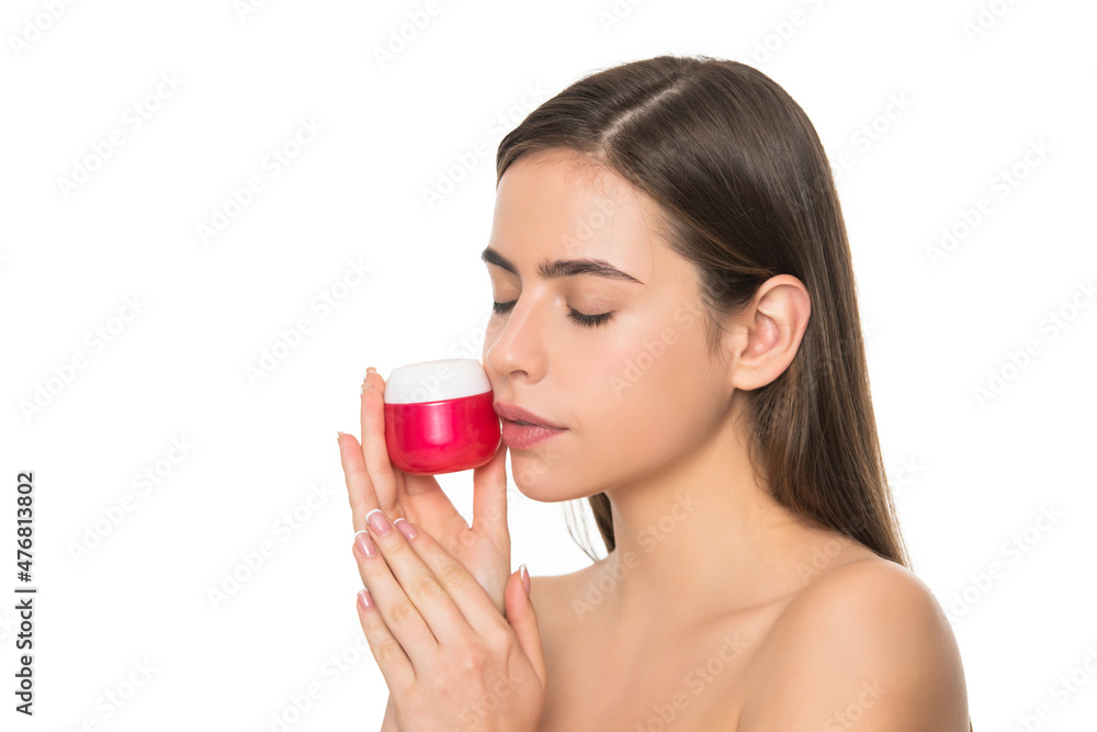 young woman hold cream jar for face skin isolated on white background with copy space, advert young woman hold cream jar for face skin isolated on white background with copy space, advert