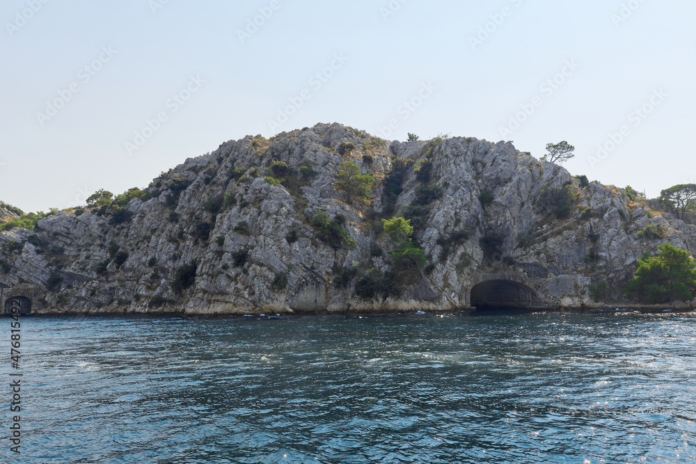 View from the sea to the rocky coast. Dramatic marine background. Adriatic Sea in Croatia