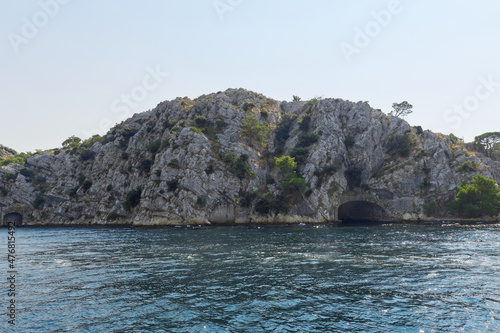 View from the sea to the rocky coast. Dramatic marine background. Adriatic Sea in Croatia
