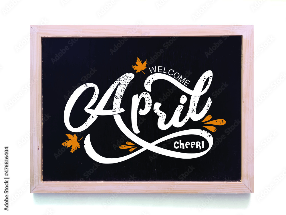 Hand drawn calligraphy and text welcome April on black board Hand drawn calligraphy and text welcome April on black board