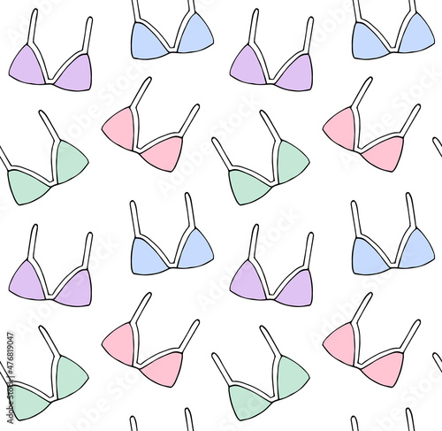 Vector seamless pattern of hand drawn doodle sketch bra isolated on white background