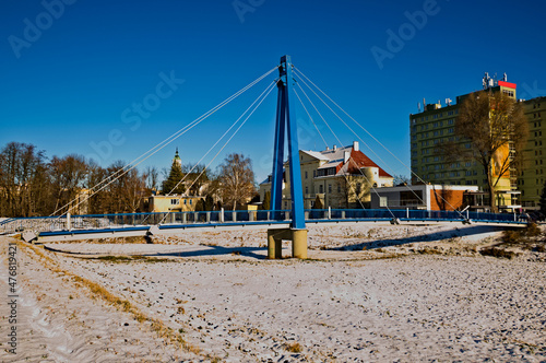 Ostrowiec Świętokrzyski - wiszący ( bujany ) most na rzece Kamiennej . photo