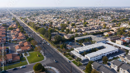 Daytime aerial view of the dense urban core of downtown Stanton, California, USA. photo