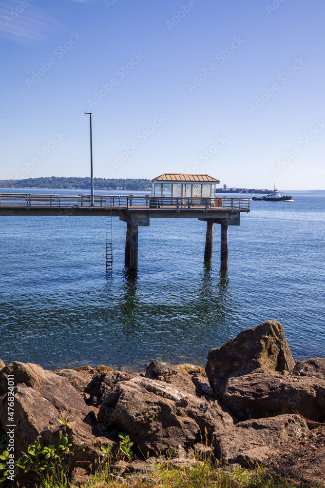 Seattle, Washington, USA - June 4 2021: Pier dock at Seattle Centennial Park during summer.