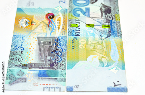 Twenty Kuwaiti dinars bill banknote 20 KWD features Seif Palace, a dhow ship, Kuwaiti pearl diver and Al-Boom traditional Kuwaiti dhow ship, Kuwaiti dinar currency of the State of Kuwait isolated photo