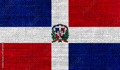 Dominican Republic flag on knitted fabric. 3D-image