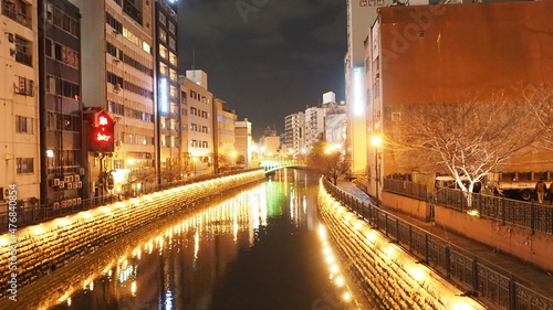 Illumination river flowing through the city