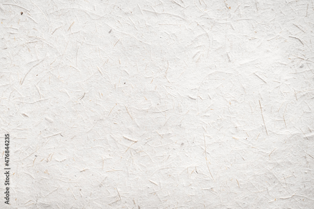 White craft paper texture background from made natural leaves. Recycled paper texture background banner concept. White craft paper texture background from made natural leaves. Recycled paper texture background banner concept.