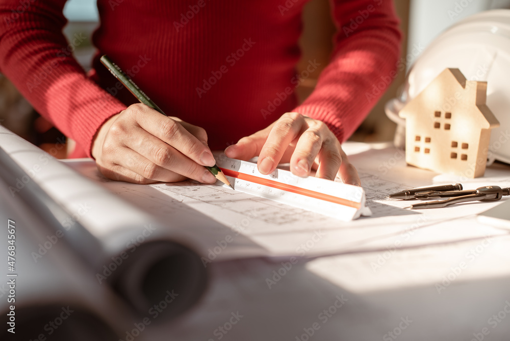 Architect working on blueprint. Architects workplace - architectural ...