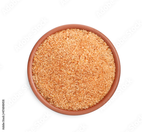Pink salt with spices in bowl isolated on white, top view