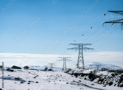 line in the mountains,Electrical poles in winter