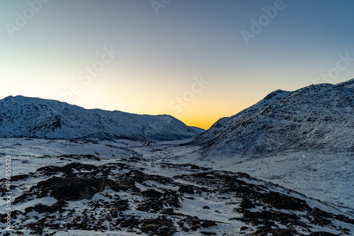 Snowy Mountain valley with a  Sunset  during Polar Night - Landscape Photography