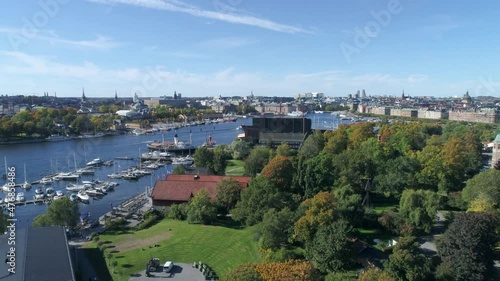 Panorama of Stockholm city on a sunny day - Grona Lund amusement park, Djurgarden and Stockholms inlopp photo