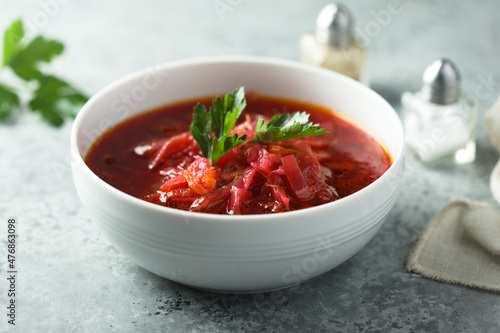 Traditional homemade beetroot soup with fresh parsley