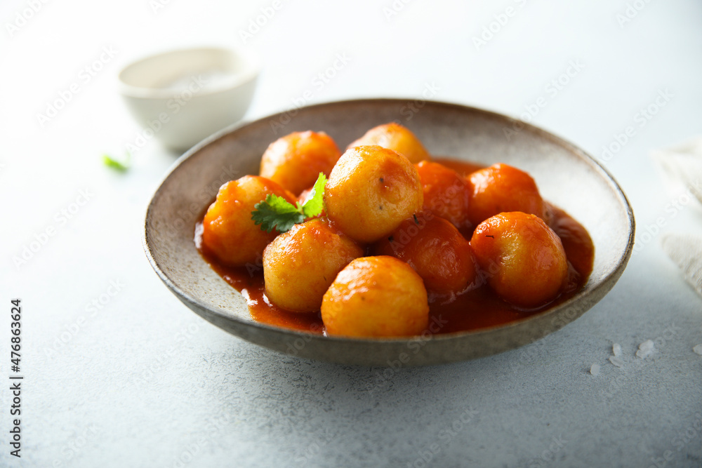 Traditional homemade dumplings with tomato sauce Traditional homemade dumplings with tomato sauce