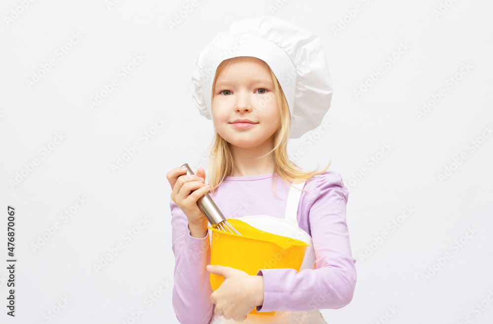 Beautiful little girl in chef uniform isolated on white Beautiful little girl in chef uniform isolated on white