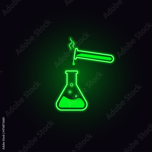  Glass flasks with green liquid on a dark background. Neon effect of objects. The process of pouring liquid from a flask into a flask. For the design of scientific processes