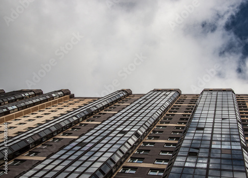 residential building against the background of clouds close-up 