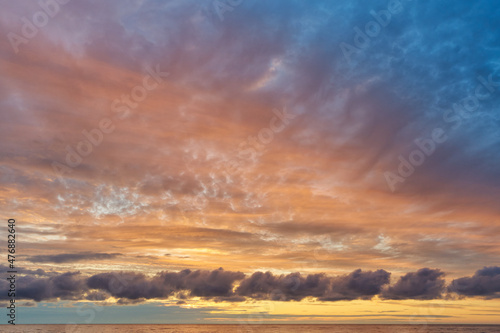 Sunset sky over Baltic Sea. © Marek Walica