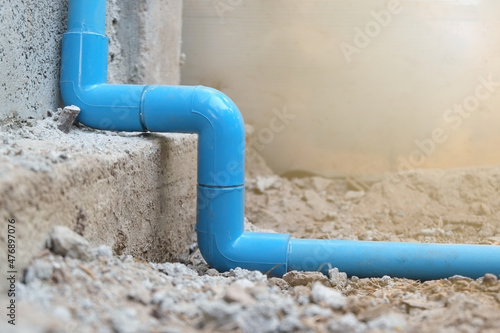 Blue PVC pipe line joint connection water for supplying water to use in homes close-up.