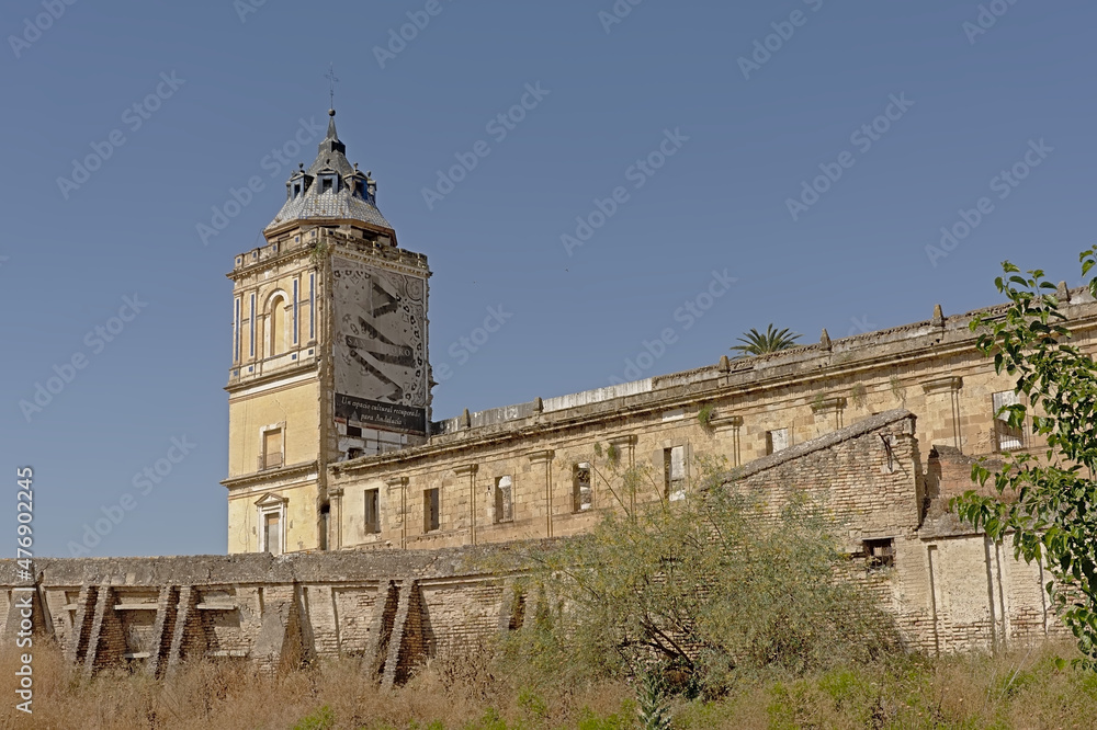 Old abaondoned church and bell tower of the Monasterio De San Isidoro Del Campo in santiponce, Seville, Spain 