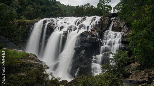 Stunning View of Thoovanam Waterfall long exposure milky water in tamilnadu kerala western ghats