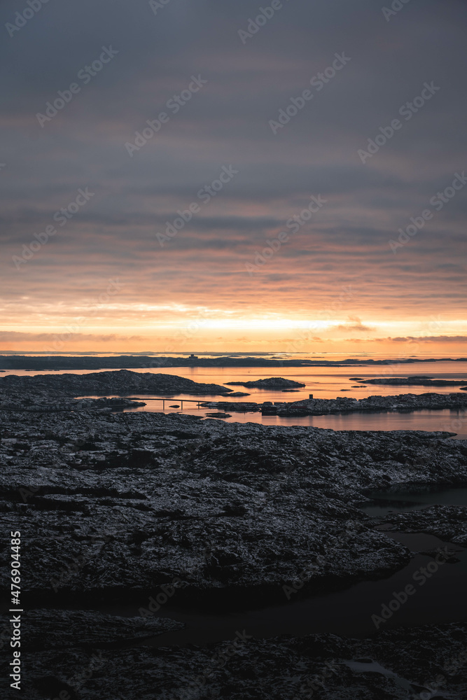 Fototapeta premium sunset over the sea in the swedish archipelago during winter